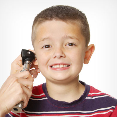 Child receiving an ear check