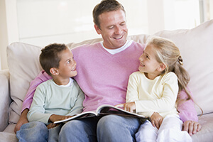 dad reading with kids