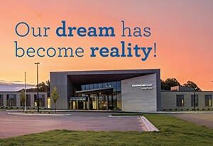 Image of long prairie center with text "our dream has become reality"